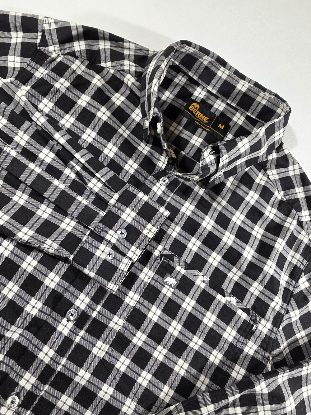 Berne men’s Black & White Plaid Button-Down Shirt. Medium new w/o tags.